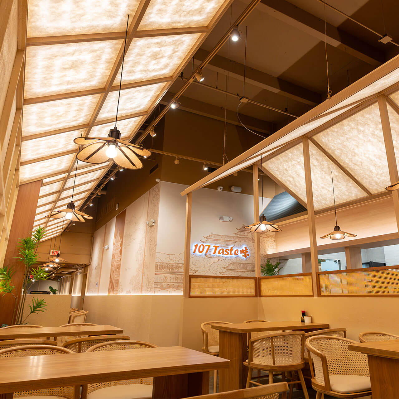 Interior of 107 Taste restaurant in South Miami, showcasing modern decor and comfortable seating in an inviting atmosphere for enjoying meals with family and friends.